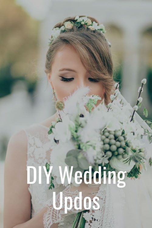 DIY wedding hair style updo, bride with veil and flowers