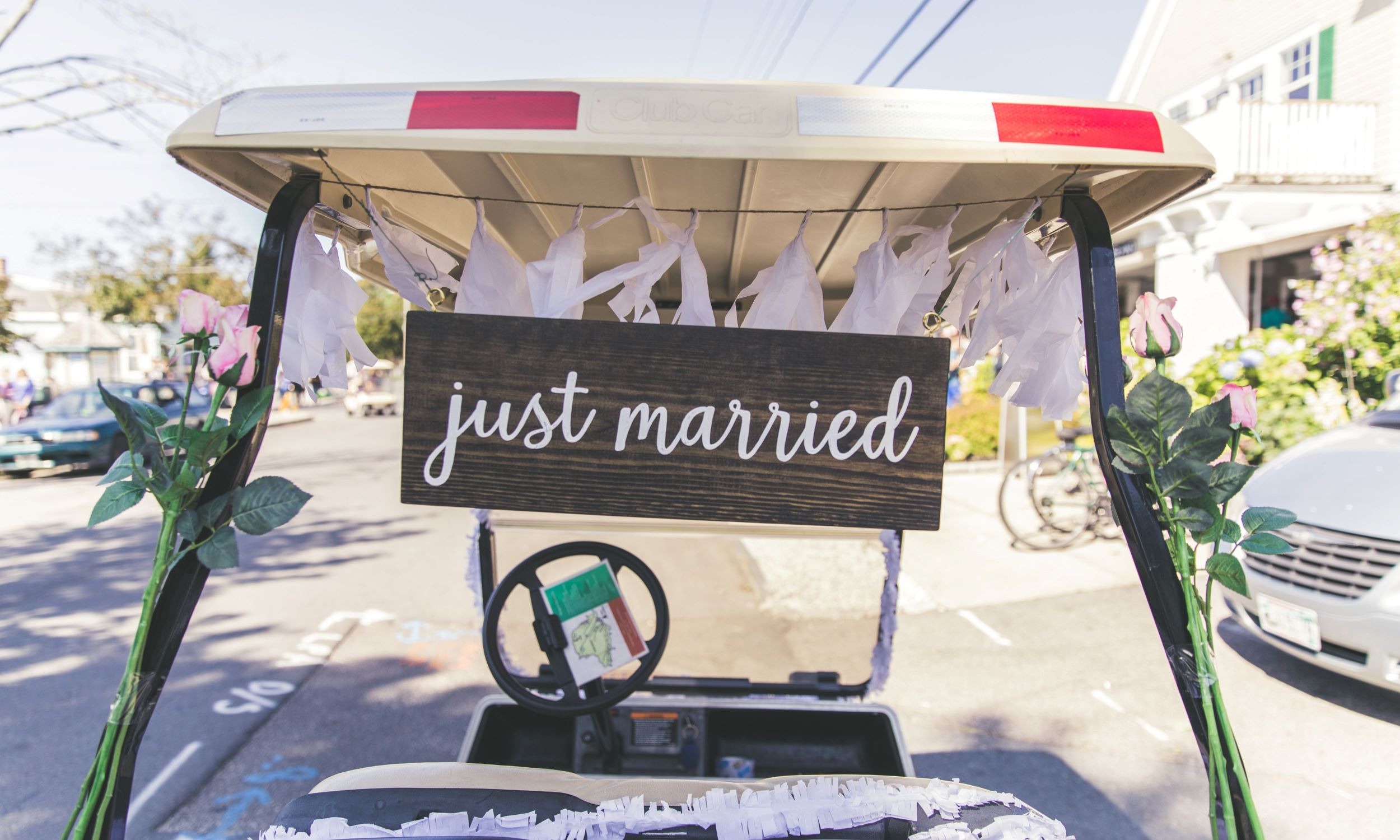 DIY wedding sign on a golf cart
